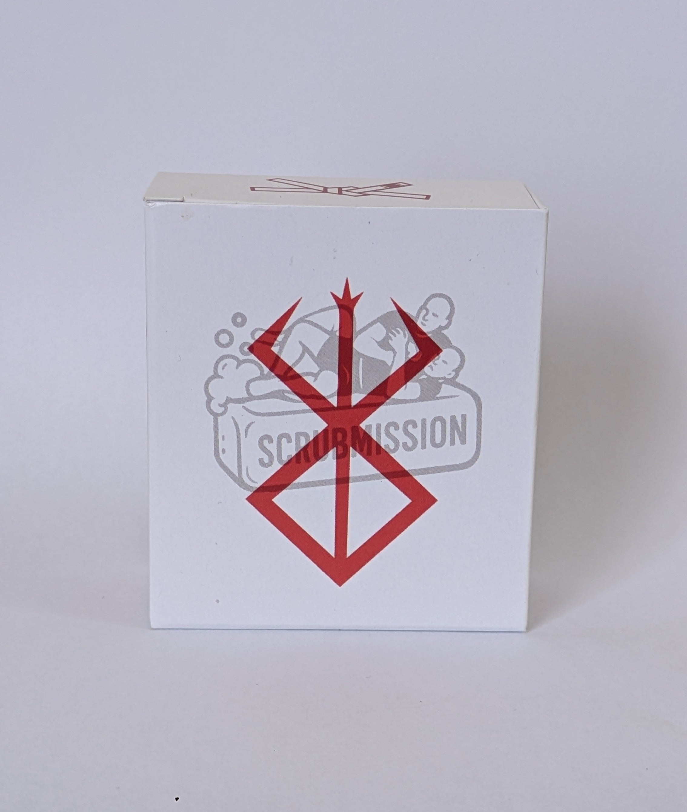 Handmade Berserk Special soap displayed on a dark stone surface with floral elements for a bold, natural look.