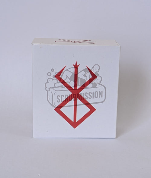 Handmade Berserk Special soap displayed on a dark stone surface with floral elements for a bold, natural look.