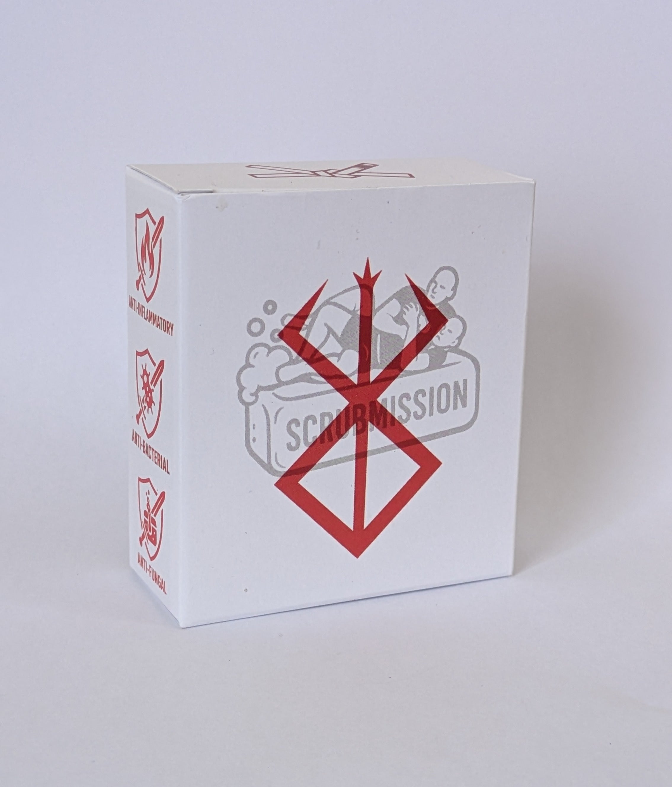 Close-up of Berserk Special soap bar wrapped in packaging with chamomile, frankincense, and palmarosa design accents.