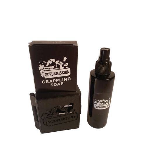 Black soap packaging with 'ScrubMission' branding on a white background