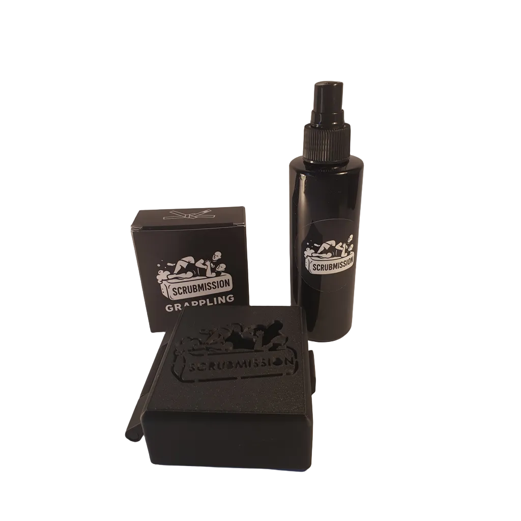 Black scrubbing tool set with 'ScrubMission' branding on a white background
