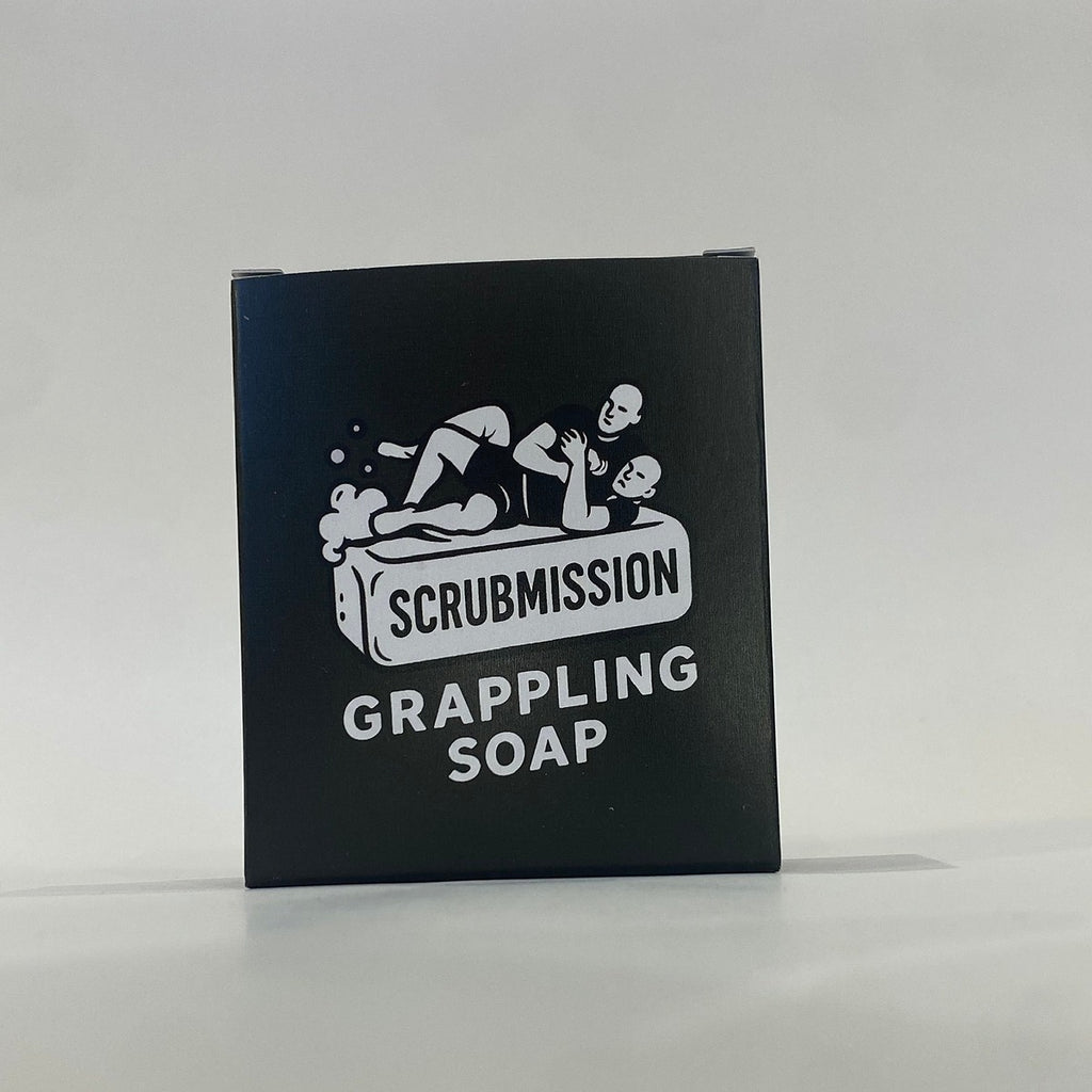 Scrubmission Soap bar with packaging featuring peppermint, tea tree, and eucalyptus design details.