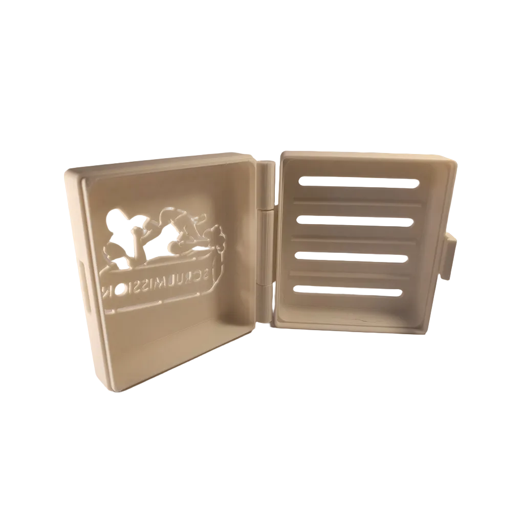 Beige plastic container with a lid, featuring cut-out designs on a white background.